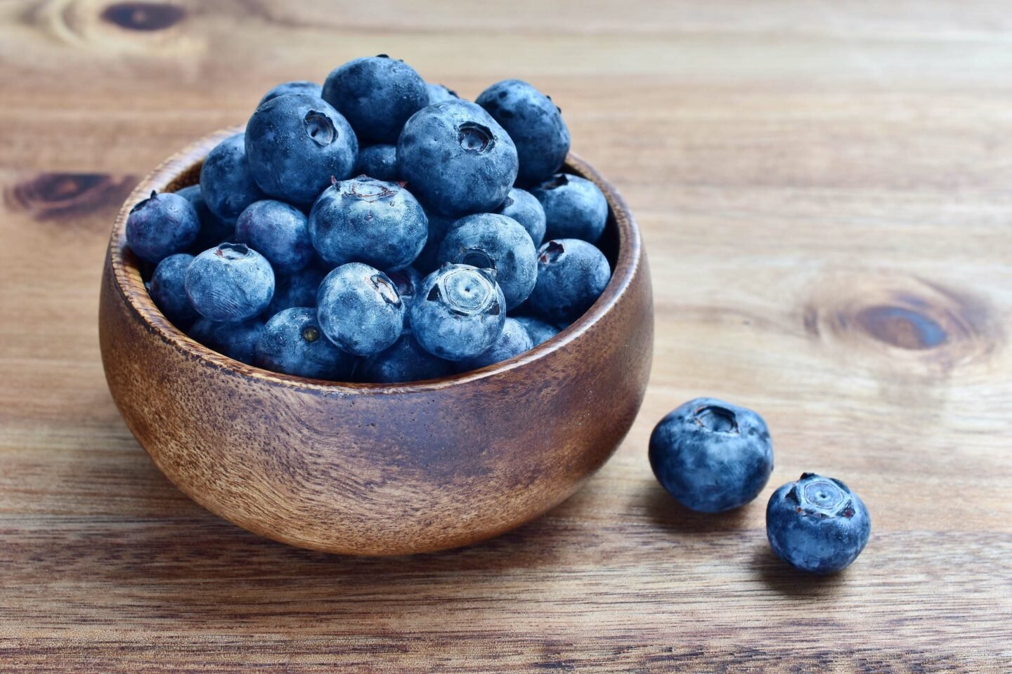 blueberries in wooden bowl