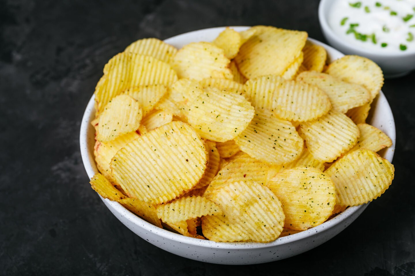 crispy potato chips and sour cream dip