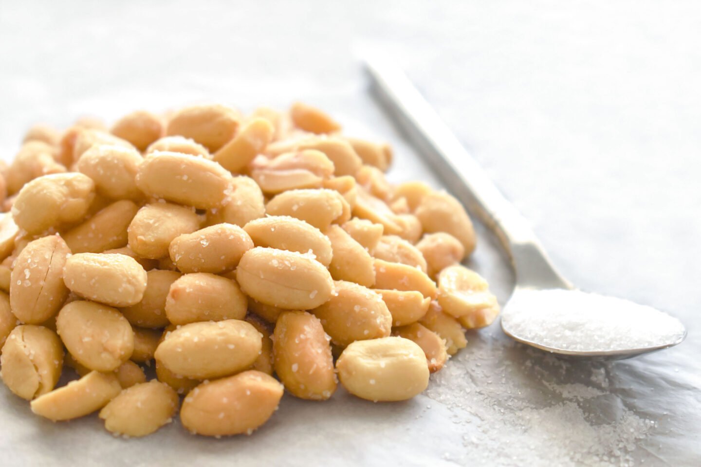 salted peanuts on parchment paper