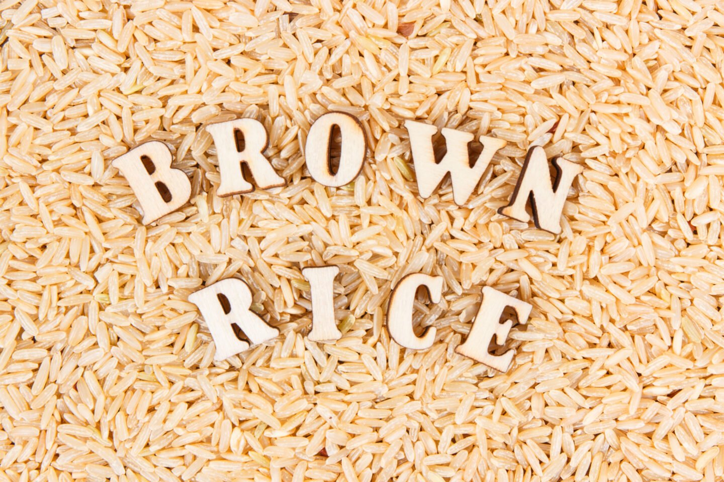 heap of brown rice with inscription