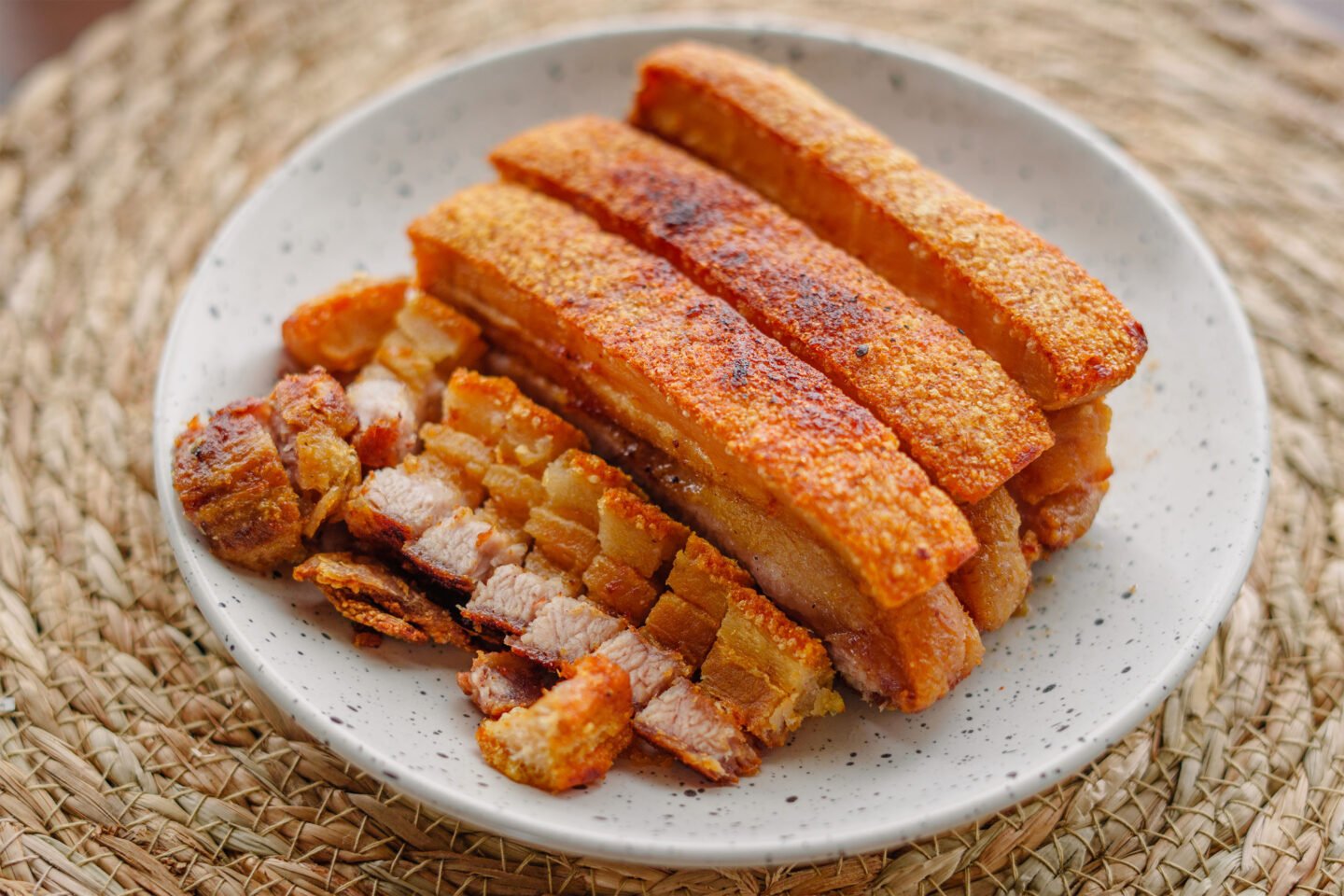 crispy fried pork belly on a plate
