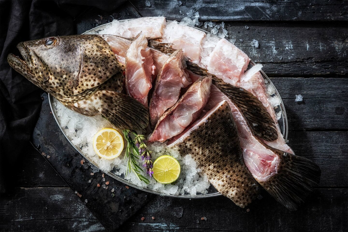 fresh grouper filleted on a plate