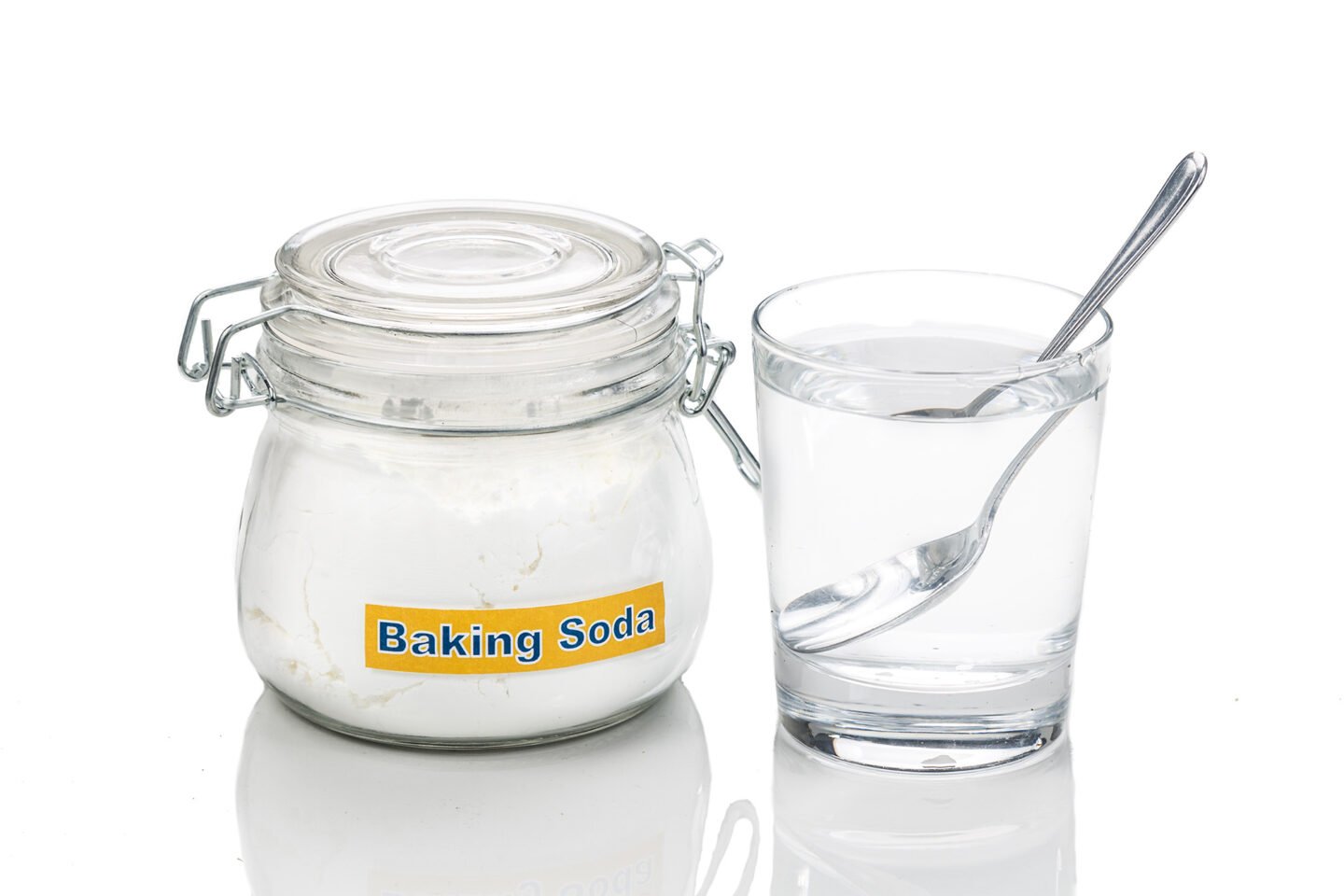baking soda in jar spoonful and glass of water