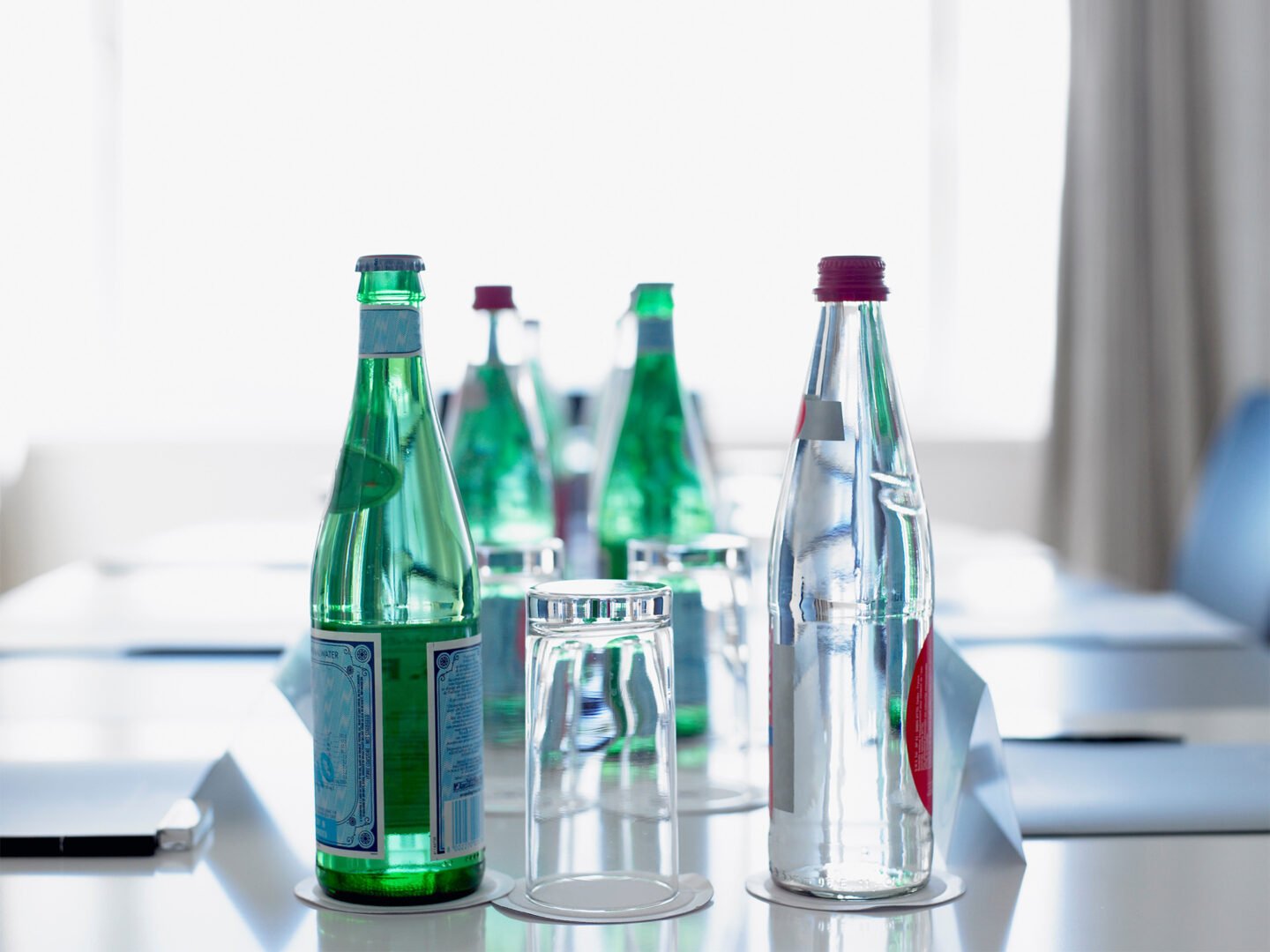 bottles of water in a conference room