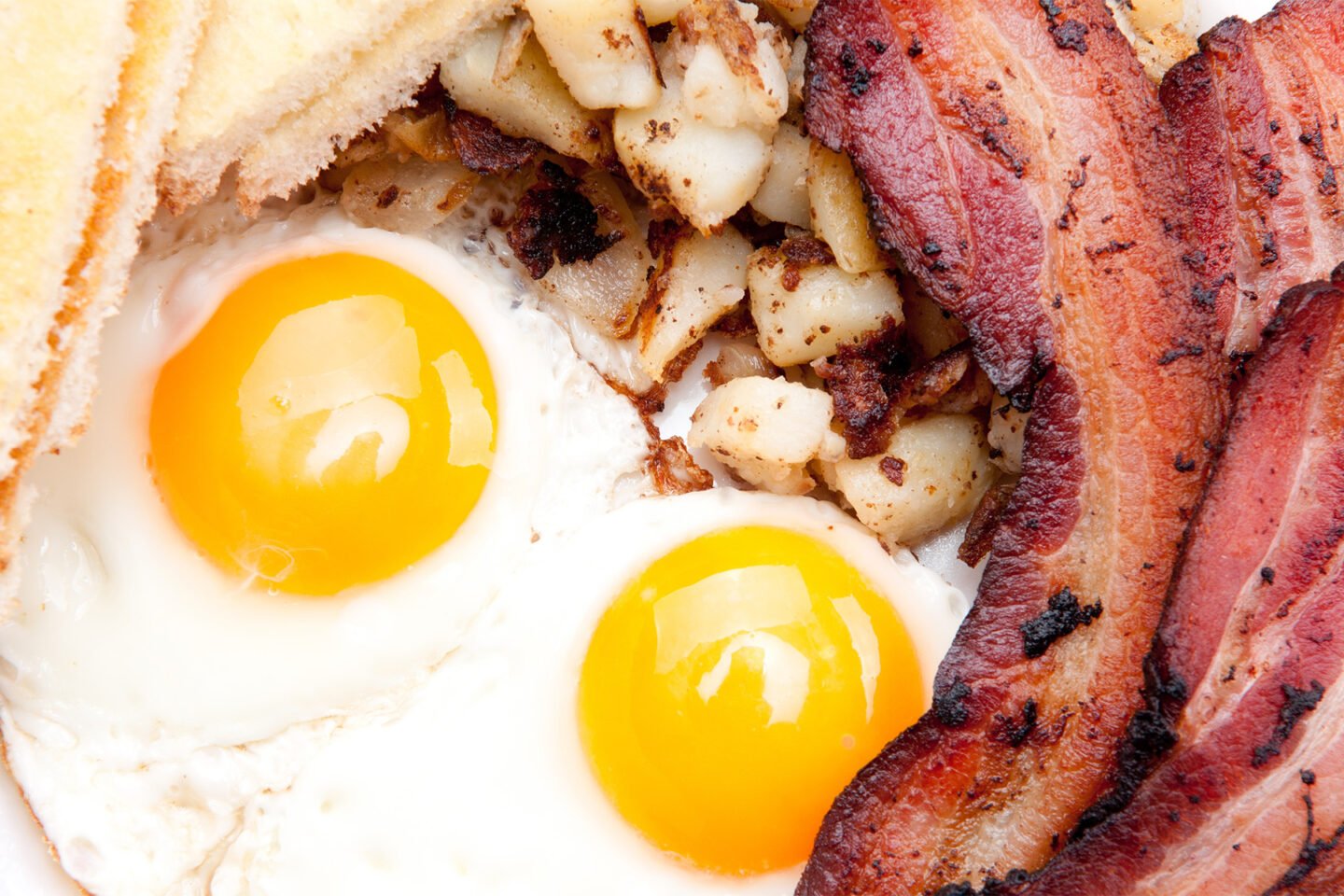 sunny side up eggs with organic bacon